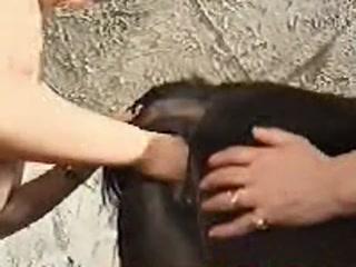 Dirty girl fisting horse pussy